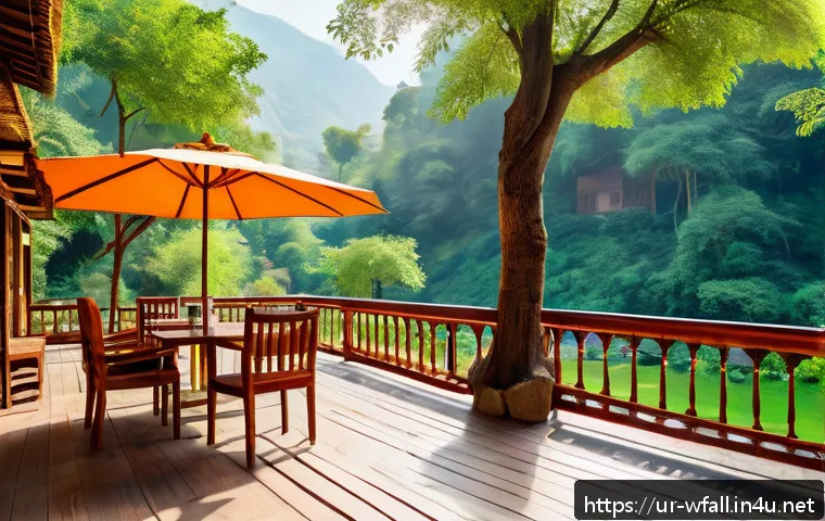 폭포 주변 카페 추천 - A serene outdoor caf&eacute; setting near a gently flowing waterfall in the lush mountains of Mansehra, Khy...